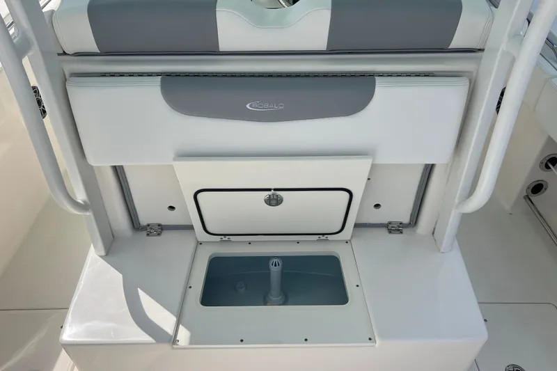  Yacht Photos Pics 2020 Robalo R302 Center Console boat interior with storage compartments and seating.