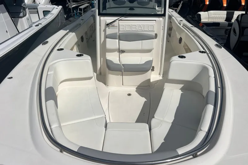  Yacht Photos Pics 2020 Robalo R302 Center Console boat with spacious seating and sleek design.