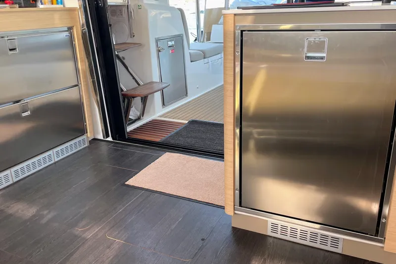 Cabalito De Mar Yacht Photos Pics Interior of 2024 Fountaine Pajot Catamaran Elba 45, featuring sleek stainless steel appliances.