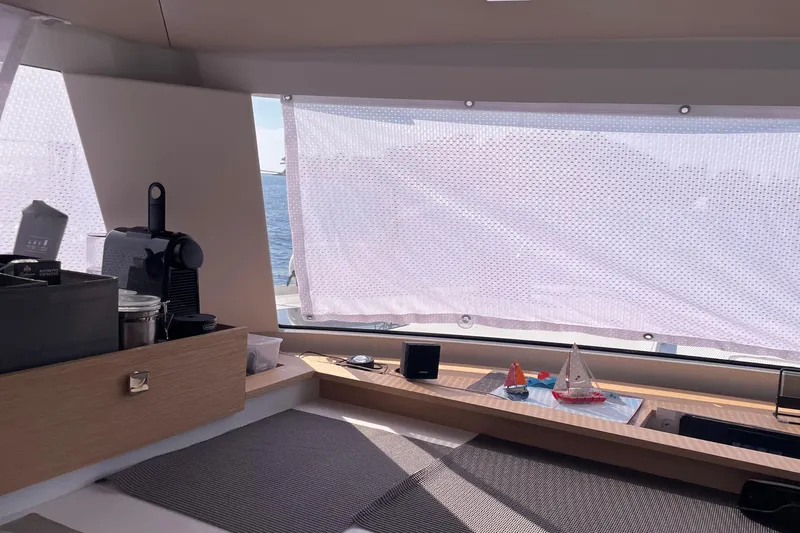 Cabalito De Mar Yacht Photos Pics Interior of 2024 Fountaine Pajot Catamaran Elba 45 with coffee maker and nautical decor.
