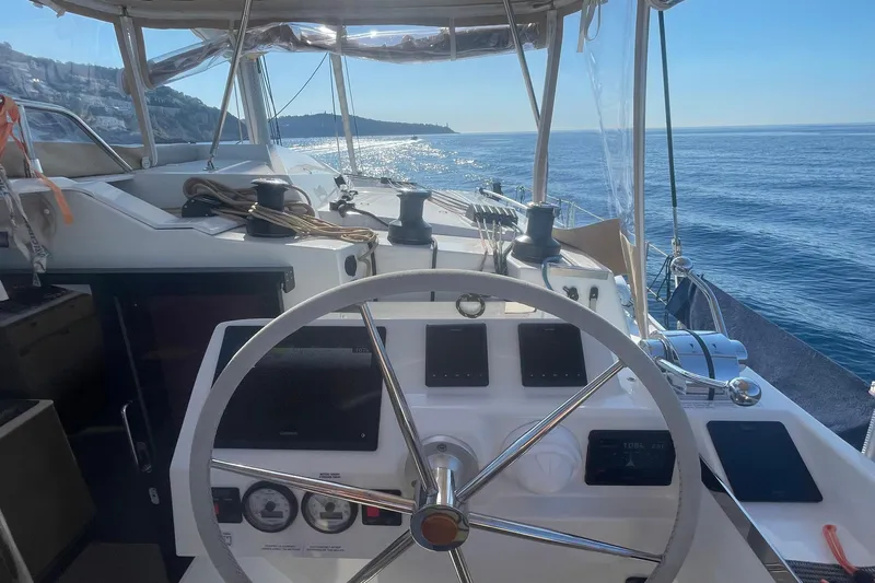 Cabalito De Mar Yacht Photos Pics 2024 Fountaine Pajot Catamaran Elba 45 helm with ocean view.