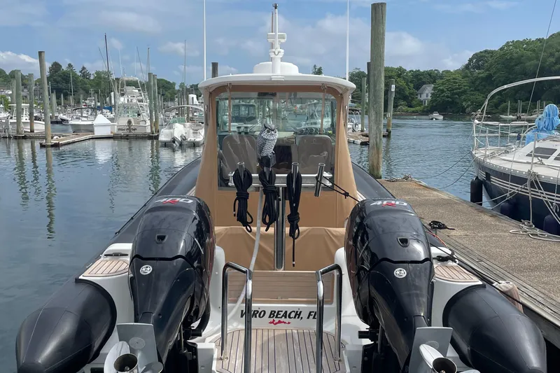  Yacht Photos Pics 2018 Protector Tauranga 38 boat docked at marina with twin engines.