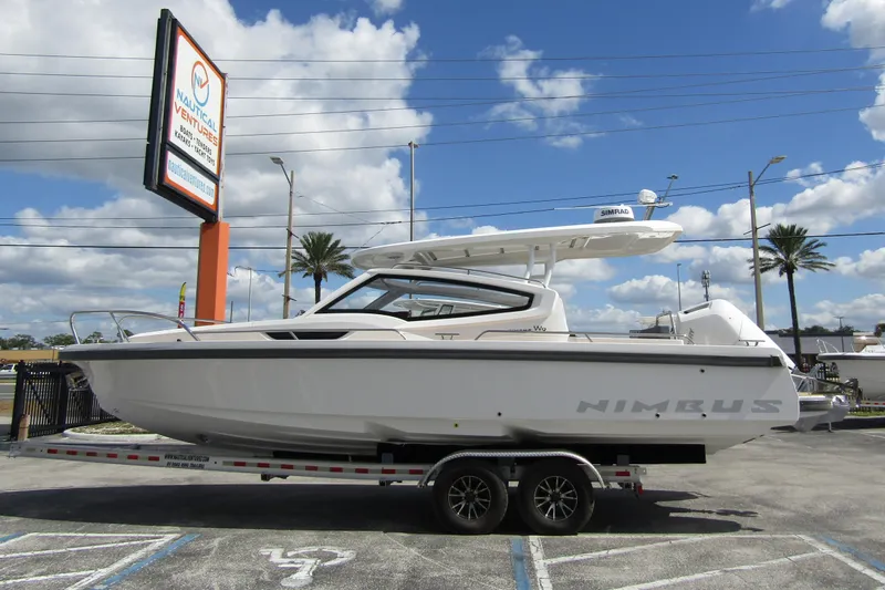  Yacht Photos Pics 2025 Nimbus Weekender 9 boat on trailer at Nautical Ventures dealership.