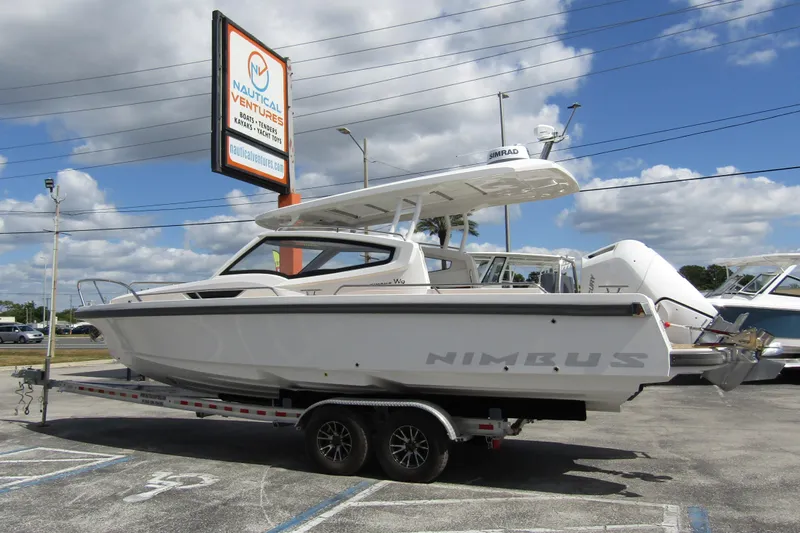  Yacht Photos Pics 2025 Nimbus Weekender 9 boat on trailer at Nautical Ventures dealership.