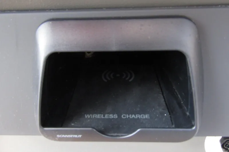  Yacht Photos Pics Wireless charging compartment in 2025 Nimbus Weekender 9 boat.