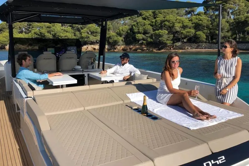  Yacht Photos Pics People relaxing on a 2026 De Antonio Yachts D42, enjoying a sunny day.