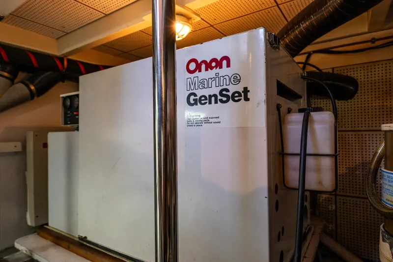 Voyageur Yacht Photos Pics Onan Marine GenSet in 1995 Grand Banks Aft Cabin 42 Classic yacht engine room.