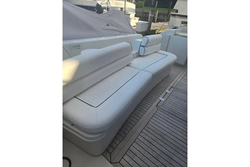Solitude Yacht Photos Pics Luxurious seating on 1997 Sunseeker Manhattan 48 yacht with sleek white cushions.