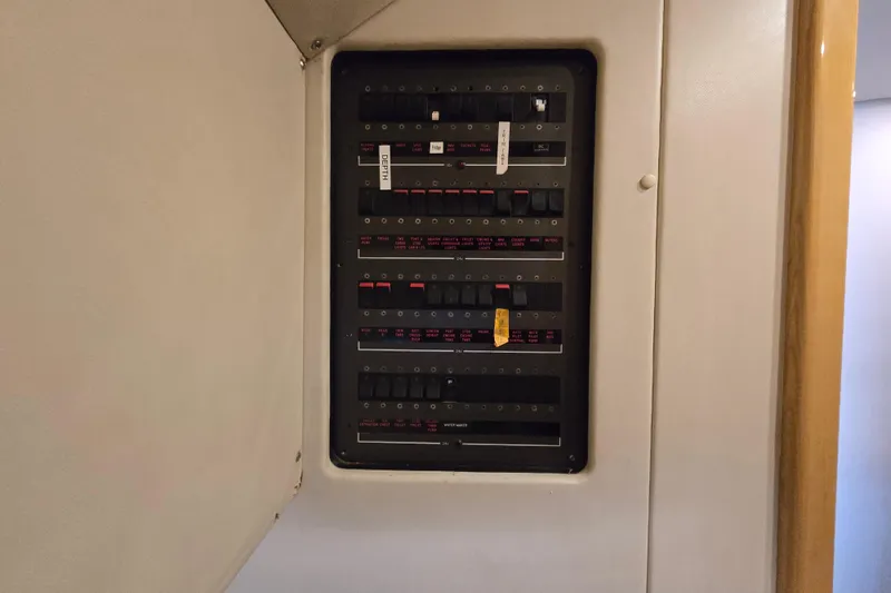 Solitude Yacht Photos Pics Electrical panel inside a 1997 Sunseeker Manhattan 48 yacht.