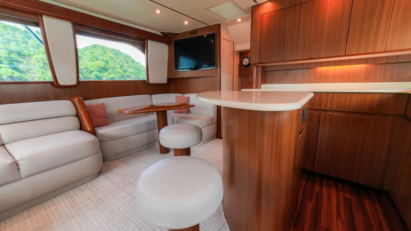 Manudito Yacht Photos Pics Luxurious interior of a 2009 Viking 50C yacht with modern furnishings.