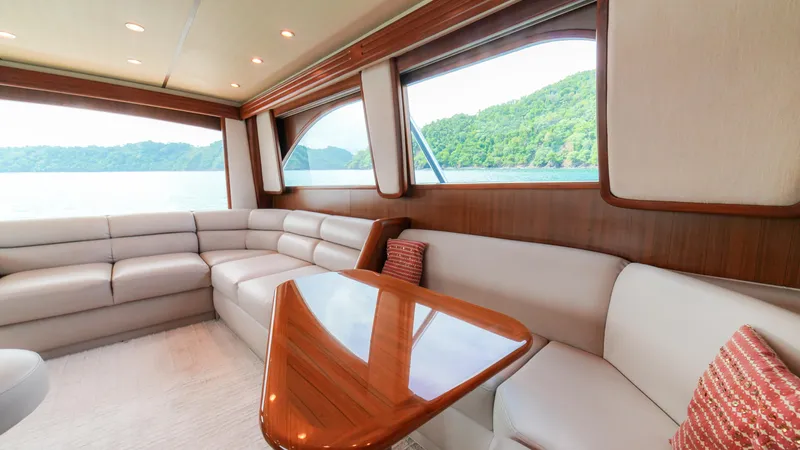 Manudito Yacht Photos Pics Luxurious interior of a 2009 Viking 50C yacht with scenic window views.