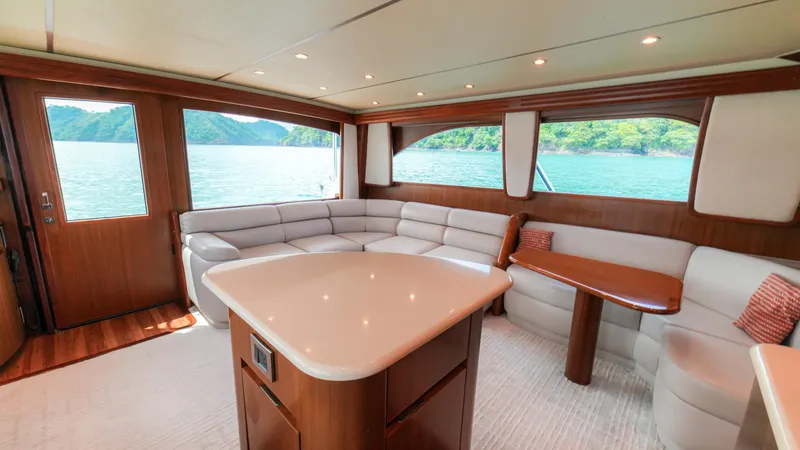 Manudito Yacht Photos Pics Luxurious interior of a 2009 Viking 50C yacht with scenic water views.