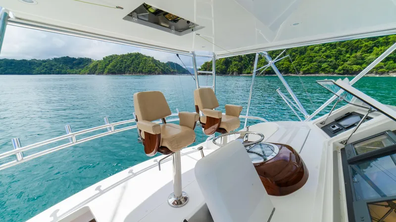 Manudito Yacht Photos Pics 2009 Viking 50C yacht helm with ocean and island view.