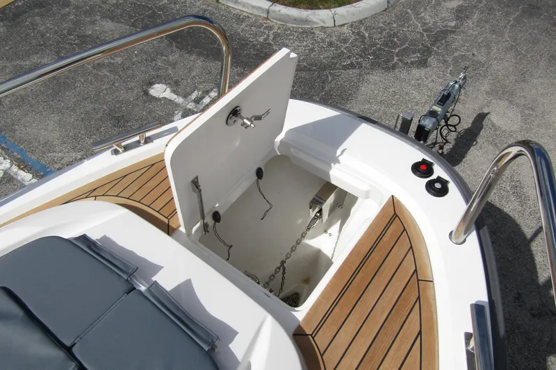  Yacht Photos Pics Open anchor compartment on 2025 Nimbus Weekender 9 boat with teak decking.
