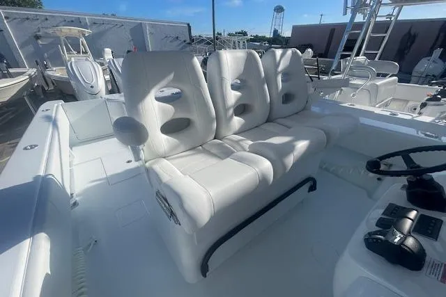  Yacht Photos Pics 2026 Contender 39 ST boat with white seating and modern helm controls.