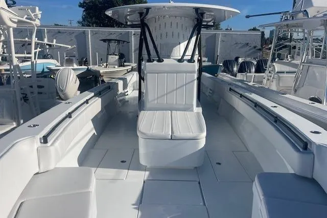  Yacht Photos Pics 2026 Contender 39 ST boat interior with seating and console, showcasing sleek design.