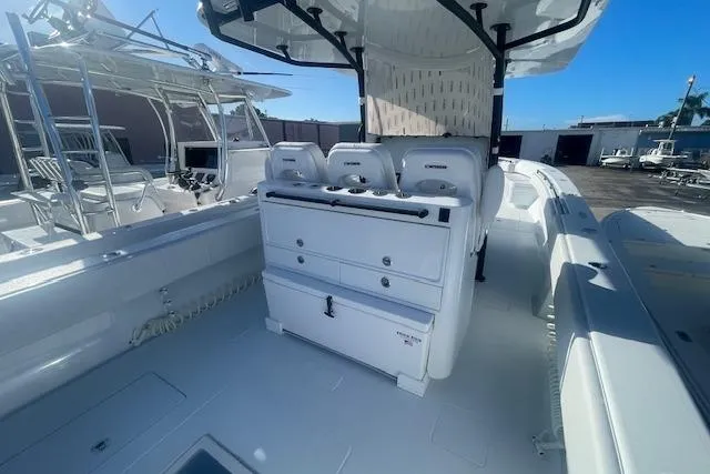  Yacht Photos Pics 2026 Contender 39 ST boat interior with seating and storage compartments.