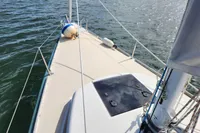 Sailboat deck view, Rustler 33, 2017 model, on calm water.