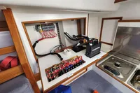 Electrical panel inside a 2017 Rustler 33 yacht, showcasing wiring and components.