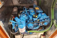 Engine compartment of a 2017 Rustler 33 yacht, featuring a blue marine engine.