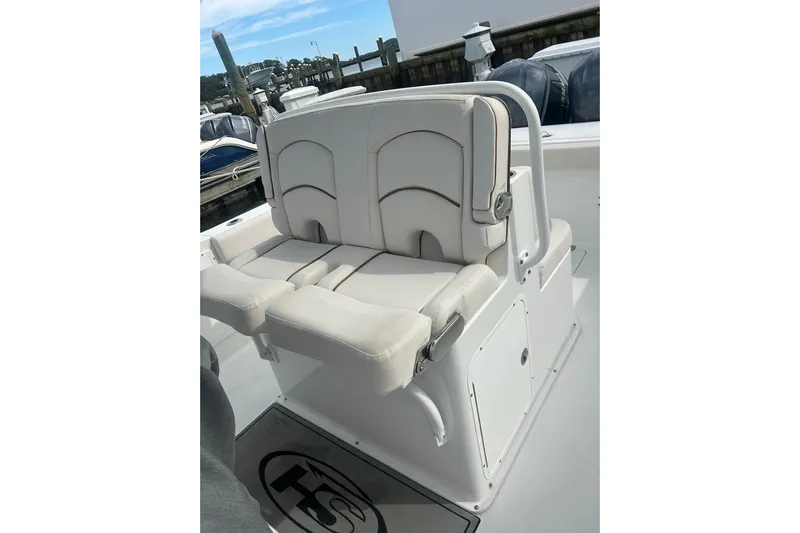  Yacht Photos Pics 2021 Sea Hunt Gamefish 27 Coffin Box boat seating area with white cushioned seats.
