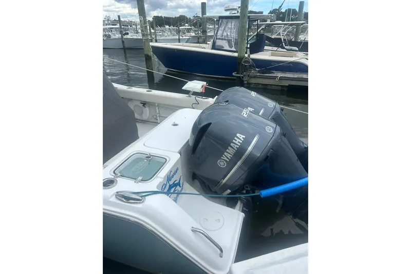  Yacht Photos Pics 2021 Sea Hunt Gamefish 27 Coffin Box with Yamaha engines docked at marina.