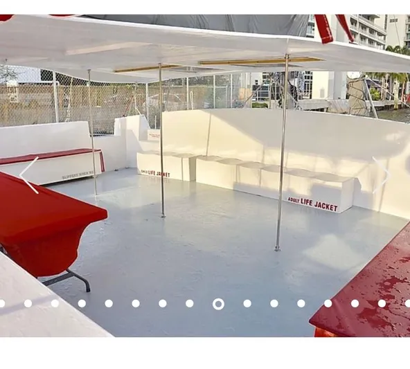  Yacht Photos Pics Spacious deck of 1987 Custom Suncoast Catamaran with seating and life jacket storage.