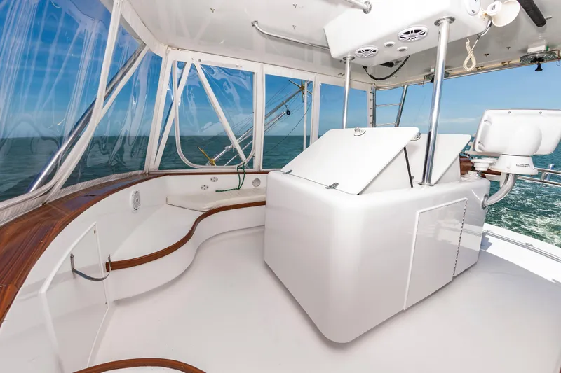 Carolina Girl Yacht Photos Pics 1993 Jarrett Bay Convertible boat interior with sleek design and ocean view.