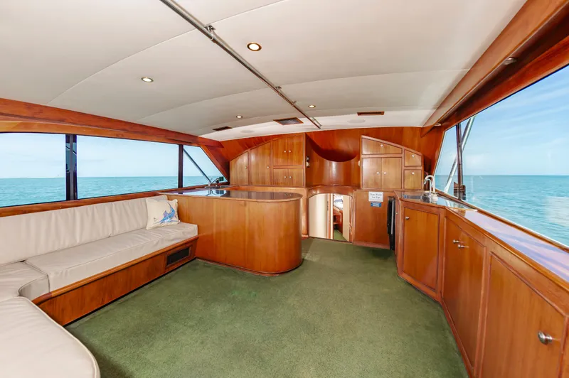 Carolina Girl Yacht Photos Pics Luxurious interior of a 1993 Jarrett Bay Convertible yacht with ocean view.