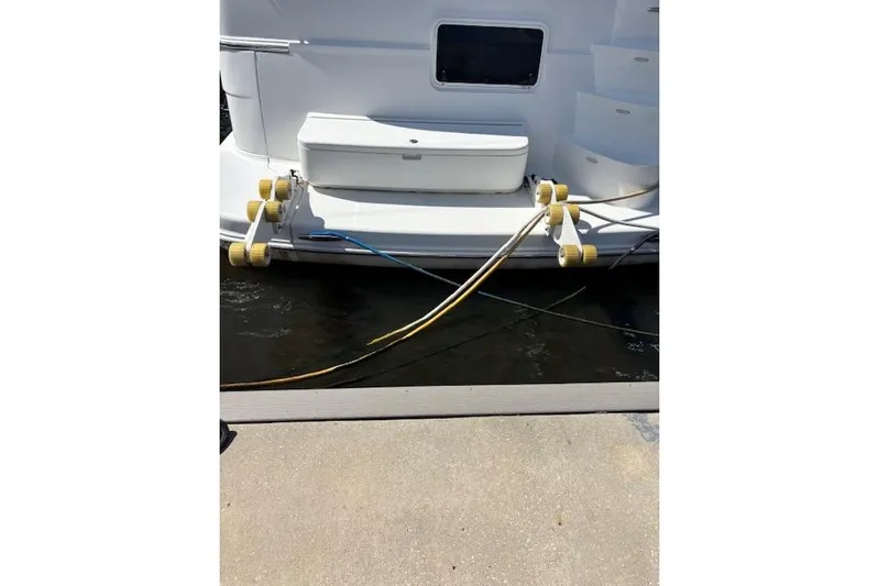  Yacht Photos Pics 2004 Carver 466 Motor Yacht docked with mooring lines and fenders.