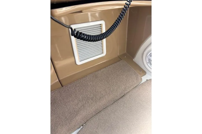  Yacht Photos Pics 2004 Carver 466 Motor Yacht interior with vent and carpeted flooring.