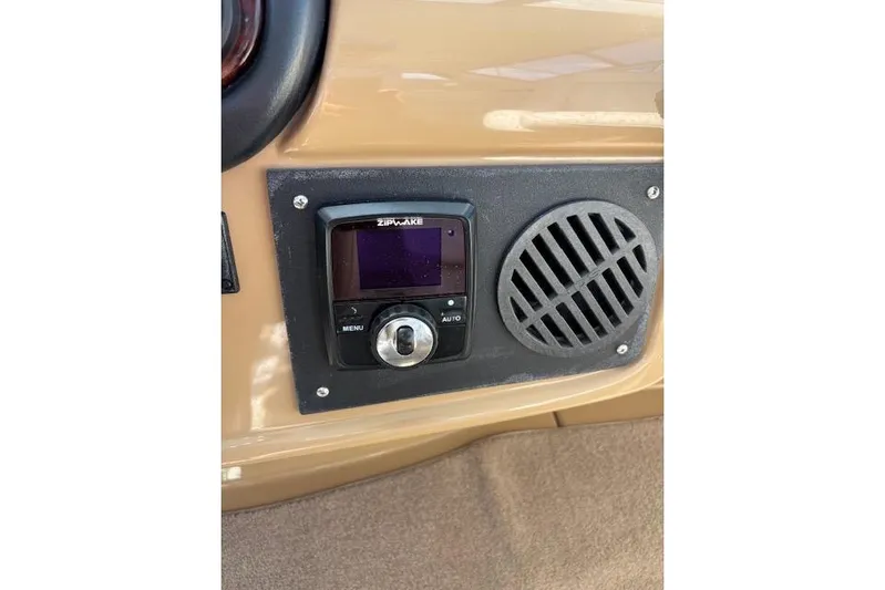  Yacht Photos Pics Control panel on 2004 Carver 466 Motor Yacht with Zipwake system and speaker grille.