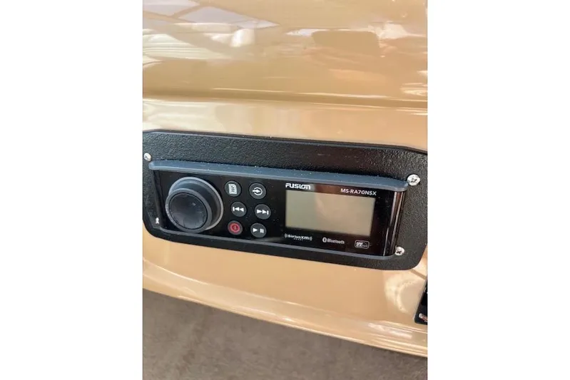  Yacht Photos Pics Control panel of a 2004 Carver 466 Motor Yacht with Fusion MS-RA70NSX stereo system.