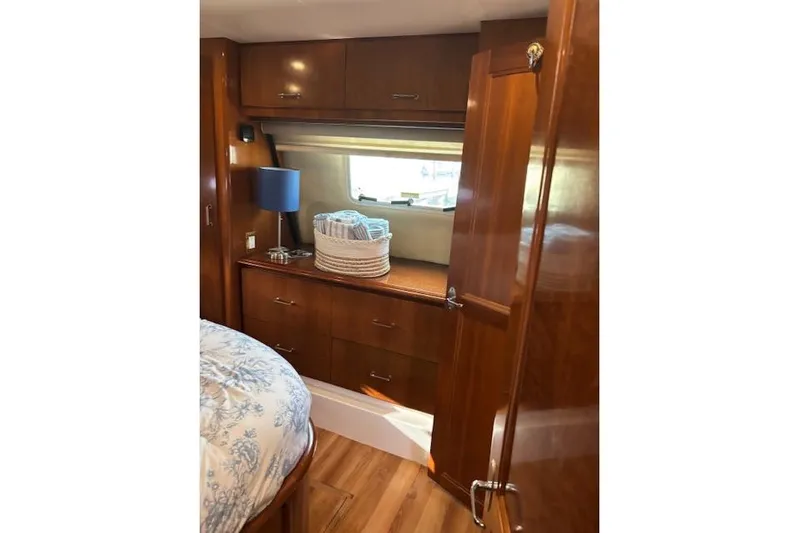  Yacht Photos Pics Interior of 2004 Carver 466 Motor Yacht with wooden cabinetry and cozy decor.