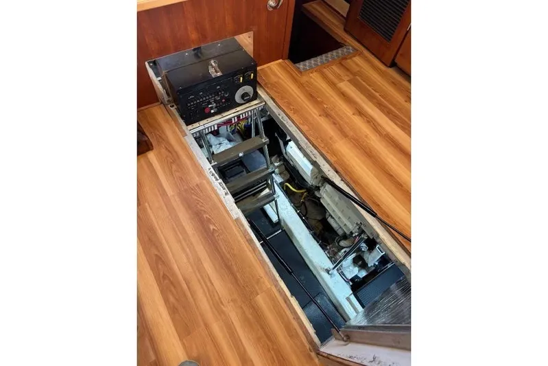  Yacht Photos Pics Engine compartment of 2004 Carver 466 Motor Yacht with wooden flooring.