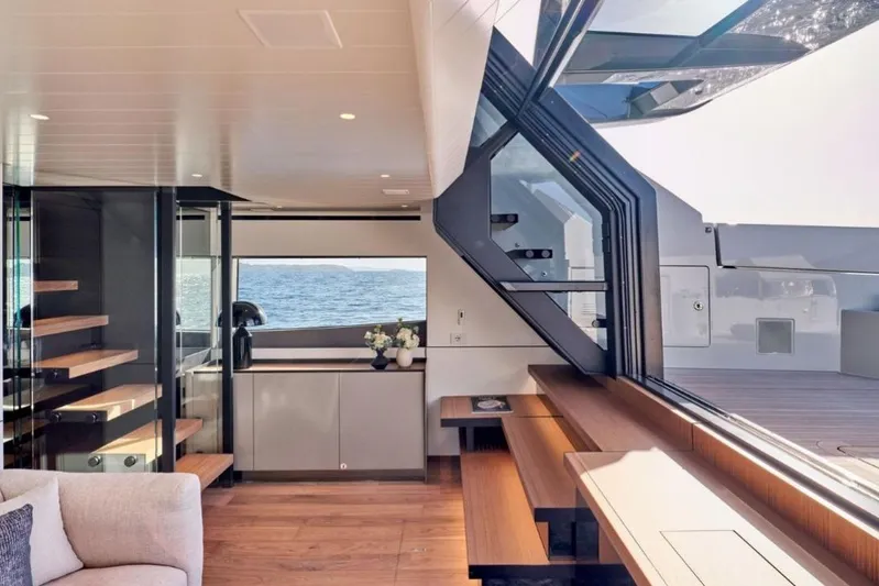  Yacht Photos Pics Luxurious interior of 2024 Bluegame BGX63 yacht with modern design and ocean view.