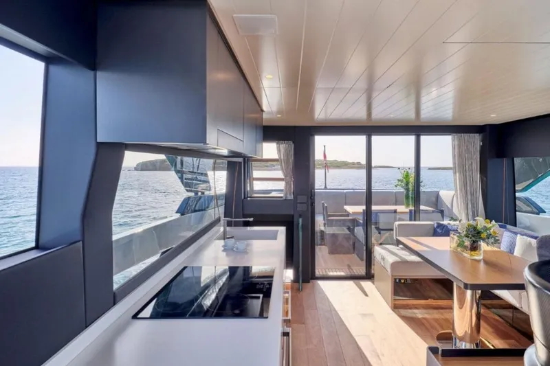  Yacht Photos Pics Luxurious interior of 2024 Bluegame BGX63 yacht with ocean view and modern design.