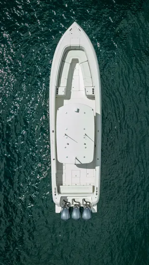  Yacht Photos Pics Aerial view of 2017 Intrepid 400 Center Console boat on water.
