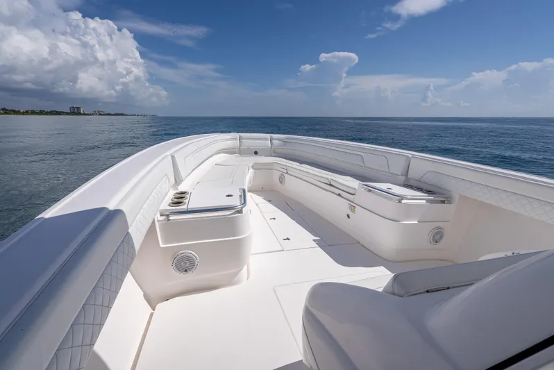  Yacht Photos Pics 2017 Intrepid 400 Center Console boat on open water, clear sky, spacious deck.