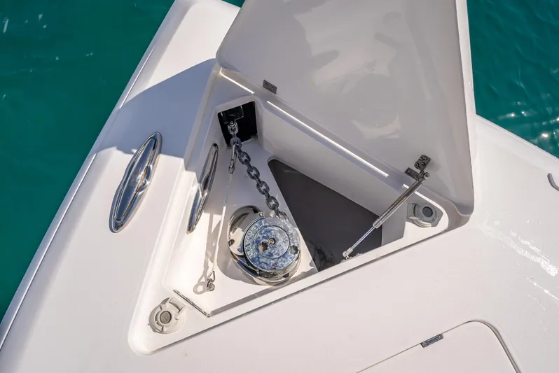  Yacht Photos Pics 2017 Intrepid 400 Center Console anchor compartment with chain and winch.