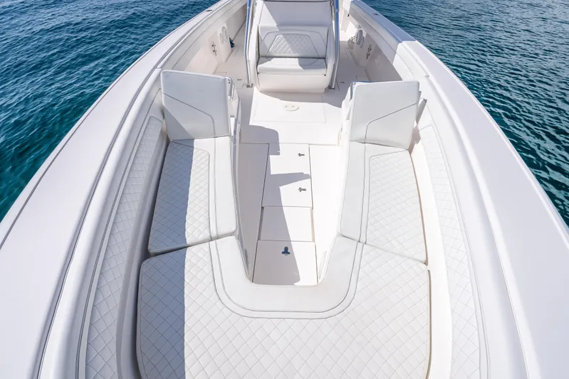  Yacht Photos Pics 2017 Intrepid 400 Center Console boat interior on calm blue water.