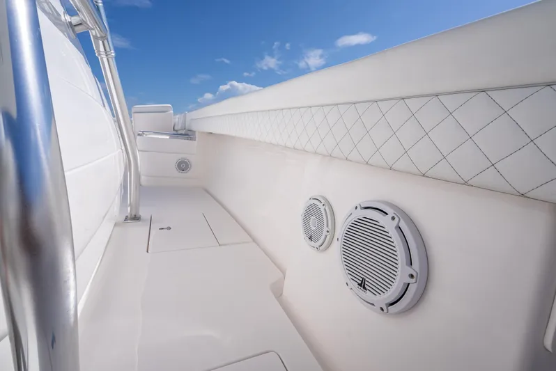  Yacht Photos Pics 2017 Intrepid 400 Center Console boat interior with speakers and quilted paneling.