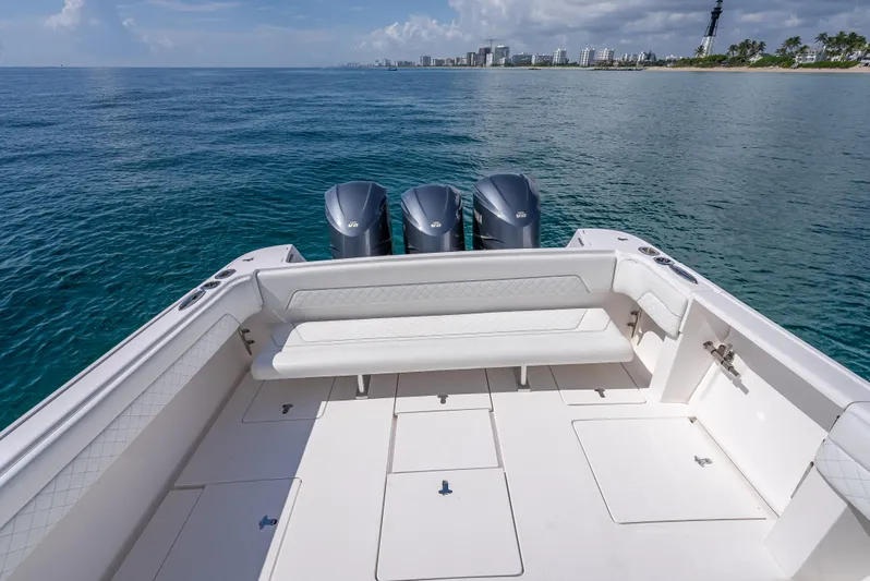  Yacht Photos Pics 2017 Intrepid 400 Center Console boat with triple engines on open water.