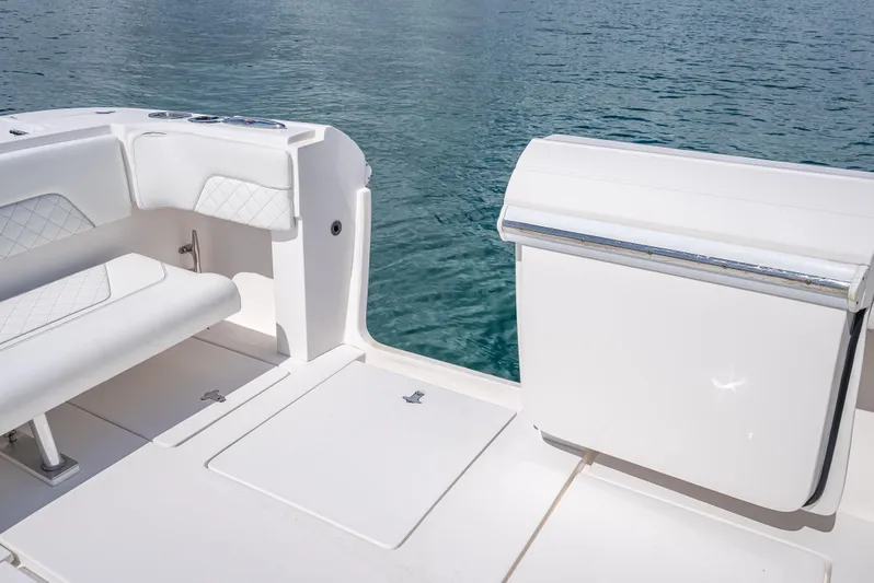  Yacht Photos Pics 2017 Intrepid 400 Center Console boat interior with white seating and ocean view.