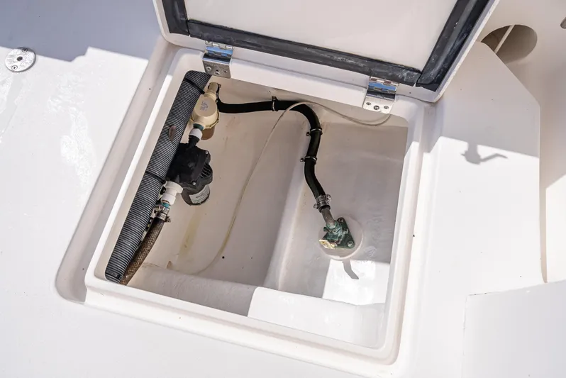  Yacht Photos Pics Open hatch of 2017 Intrepid 400 Center Console boat showing internal components.