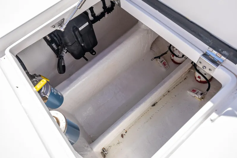  Yacht Photos Pics Storage compartment of 2017 Intrepid 400 Center Console boat, featuring electrical components.