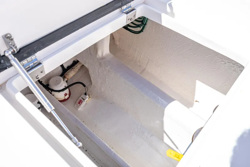  Yacht Photos Pics Open storage compartment of 2017 Intrepid 400 Center Console boat.
