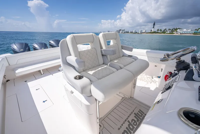  Yacht Photos Pics 2017 Intrepid 400 Center Console boat interior with plush seating and ocean view.