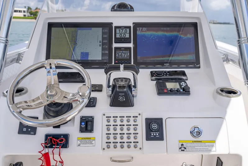  Yacht Photos Pics 2017 Intrepid 400 Center Console dashboard with navigation screens and controls.