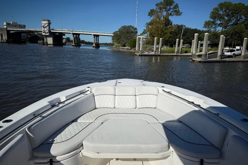 Lucky Penny Yacht Photos Pics 2022 Sea Fox 288 Commander boat interior with bridge and dock view.